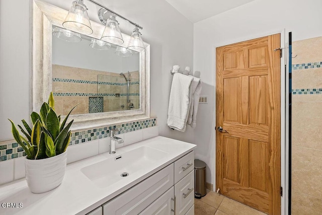 2335 Whitney Ave, Summerland, CA 93067 - bathroom featuring tasteful backsplash, tiled shower, vanity, and tile patterned flooring