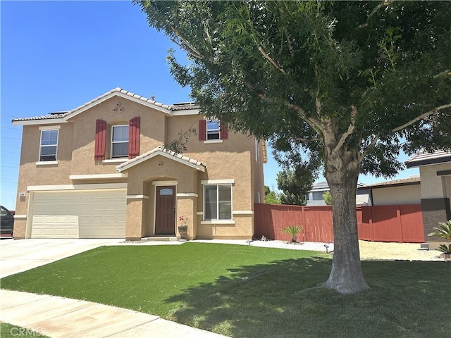 view of front of home featuring a front lawn, solar panels, and a garage