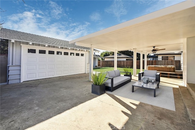 exterior space featuring a garage and an outdoor living space