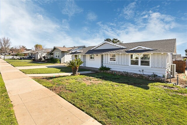 view of front of home with a front lawn