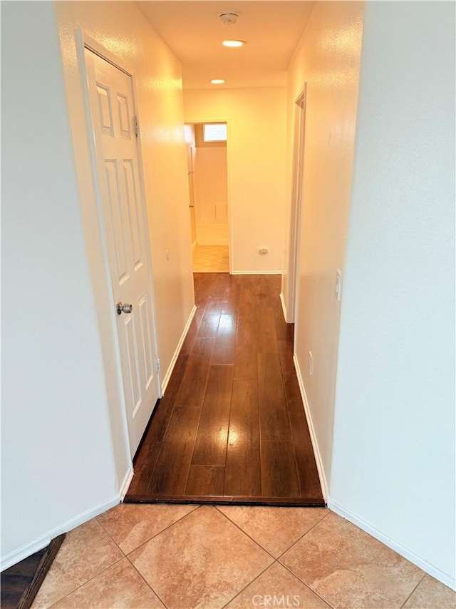 corridor featuring light wood-type flooring