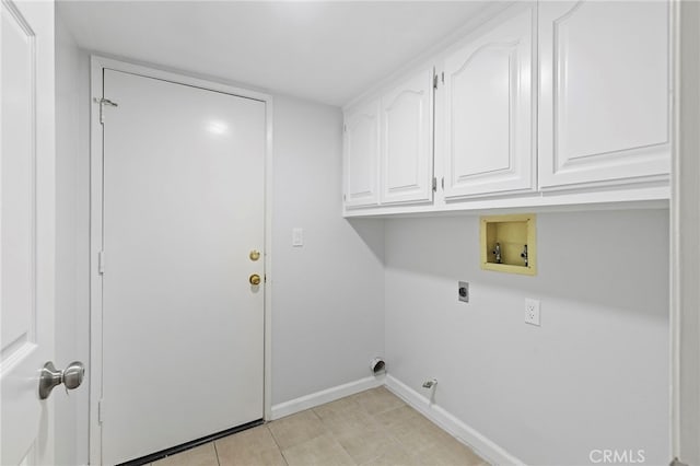 laundry room with cabinets, electric dryer hookup, and washer hookup