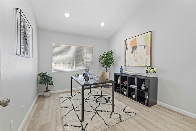 office area featuring recessed lighting, baseboards, vaulted ceiling, and wood finished floors