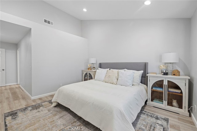 bedroom with light wood-type flooring