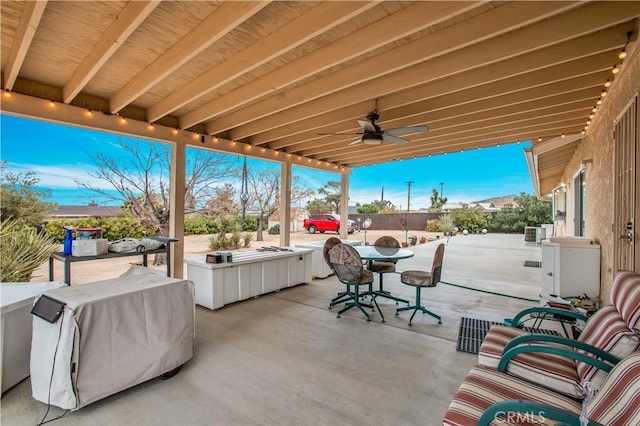 view of patio / terrace with ceiling fan and grilling area