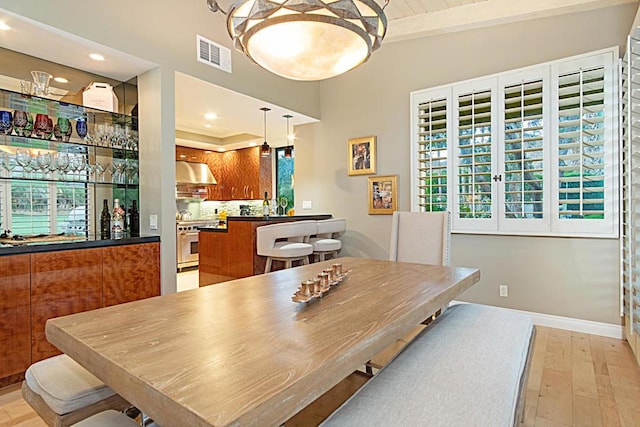 dining space with light wood-type flooring