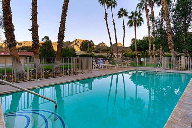 view of pool with a mountain view