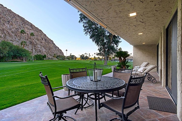 view of patio / terrace with a mountain view