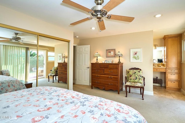 bedroom featuring ceiling fan, access to exterior, and light carpet