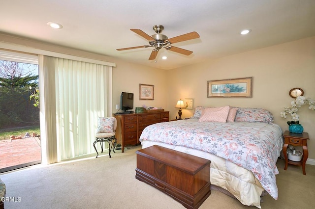 carpeted bedroom featuring access to outside and ceiling fan