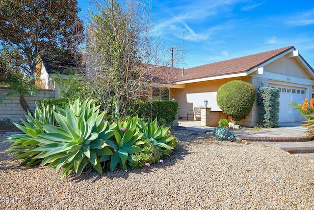 exterior space with a garage