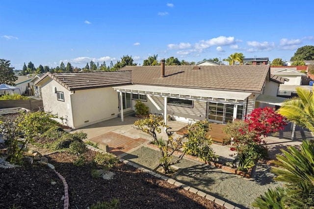 rear view of house with a patio area