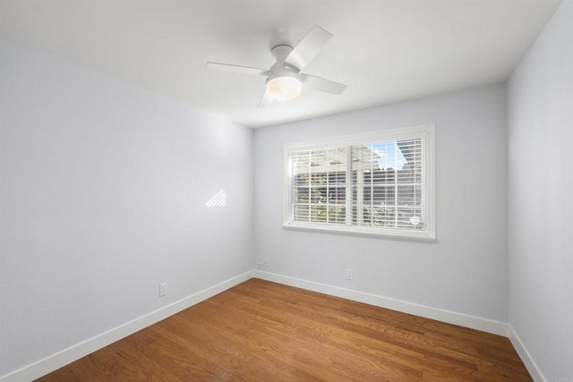 unfurnished room with ceiling fan and light hardwood / wood-style flooring