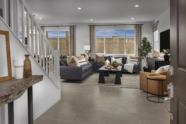 living room with tile patterned floors