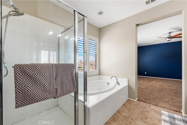 bathroom featuring ceiling fan and separate shower and tub