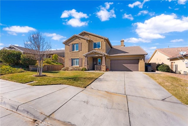 view of front of home with a front lawn and a garage