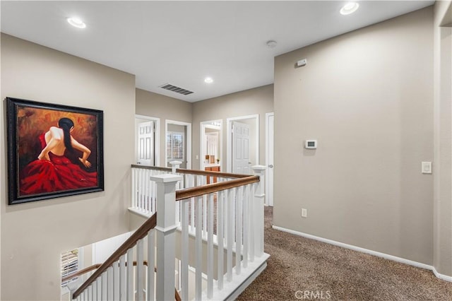 corridor featuring carpet floors