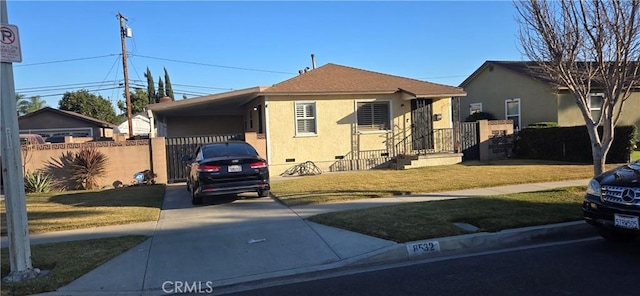 view of front facade featuring a carport and a front yard