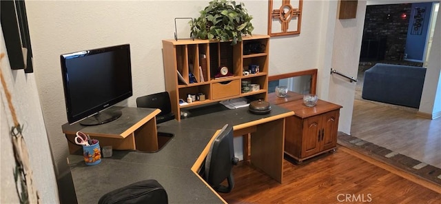 office with hardwood / wood-style flooring