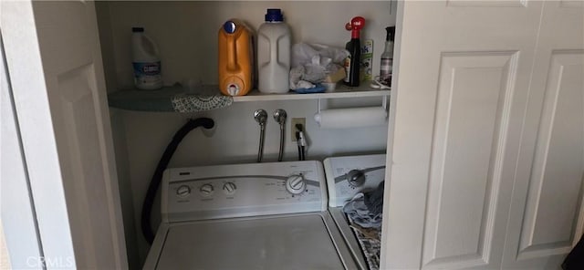 clothes washing area featuring washer / dryer