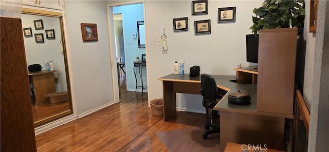 office area with dark hardwood / wood-style floors