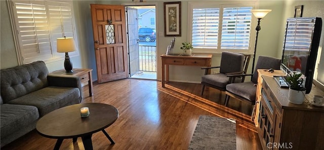 living area featuring hardwood / wood-style flooring