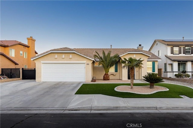 view of front of property with a garage