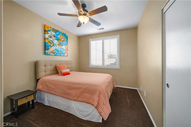 carpeted bedroom with ceiling fan