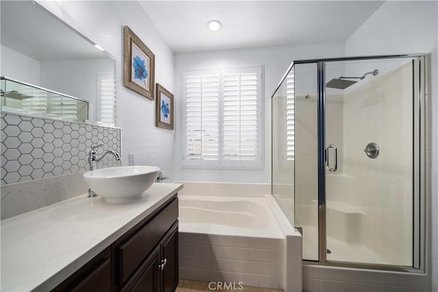 bathroom featuring vanity and plus walk in shower