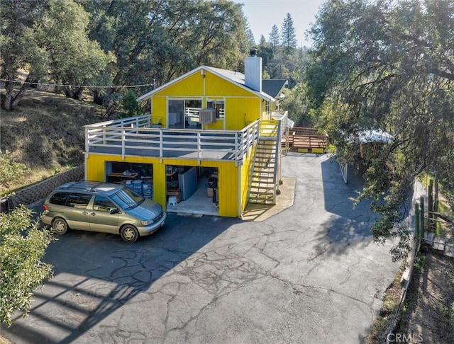 view of front of home with a wooden deck