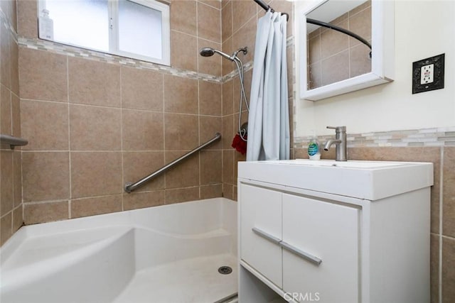 bathroom with vanity and a shower with curtain