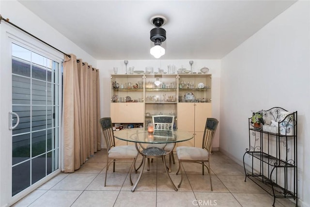 dining room featuring light tile patterned floors