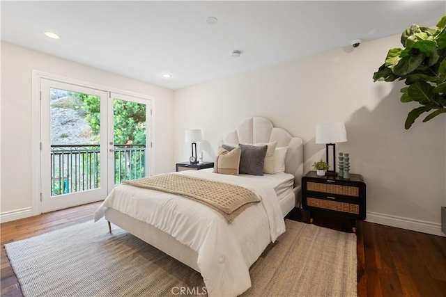 bedroom featuring access to outside and wood-type flooring