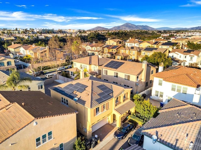 drone / aerial view featuring a mountain view