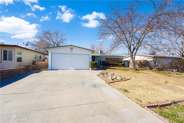 single story home featuring a garage