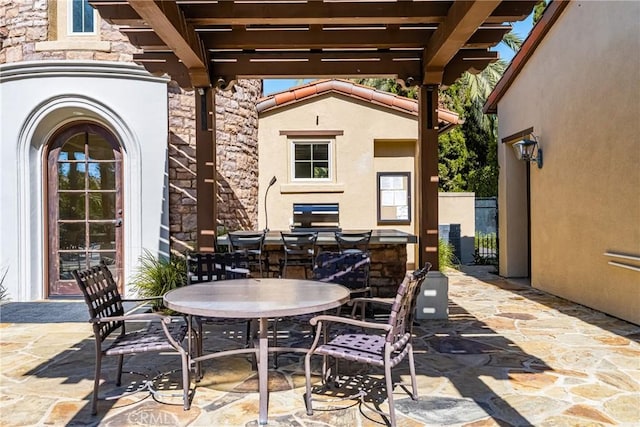 view of patio featuring a pergola