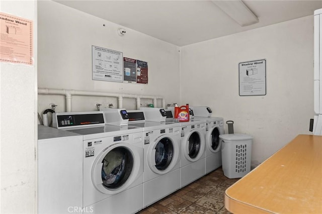 laundry room featuring separate washer and dryer