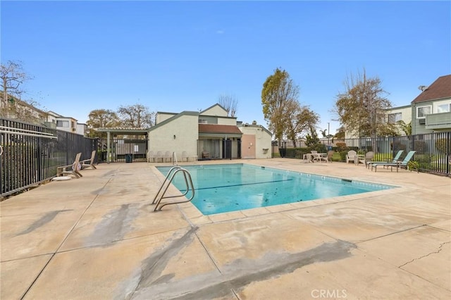 view of pool featuring a patio area