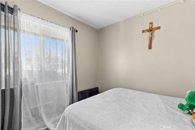 bedroom with a textured ceiling