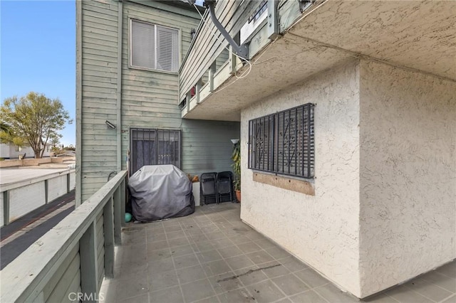 view of home's exterior featuring a balcony