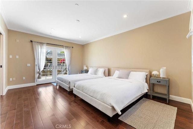 bedroom featuring access to exterior, dark hardwood / wood-style flooring, french doors, and ornamental molding