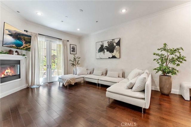 living room with french doors, ornamental molding, and dark hardwood / wood-style floors