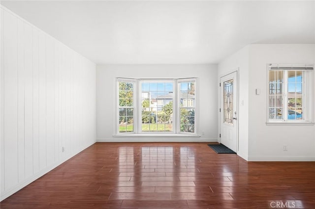 interior space with dark hardwood / wood-style floors