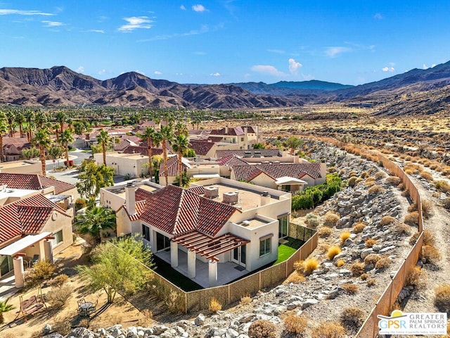 bird's eye view with a mountain view