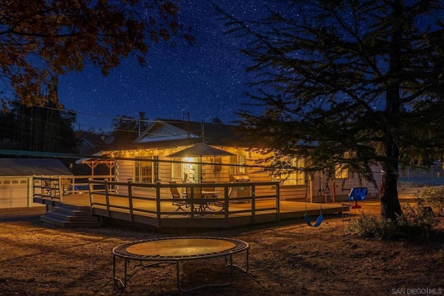 exterior space featuring a wooden deck