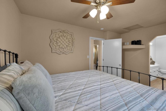 bedroom featuring ensuite bathroom and ceiling fan