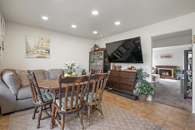 dining area with light tile patterned floors