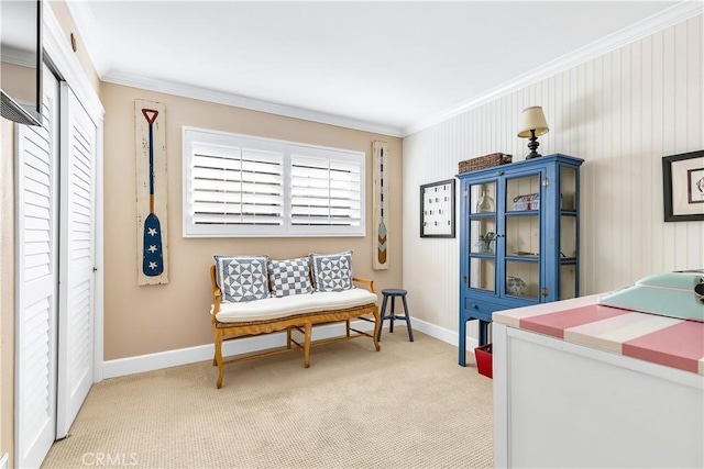 living area featuring light carpet and crown molding