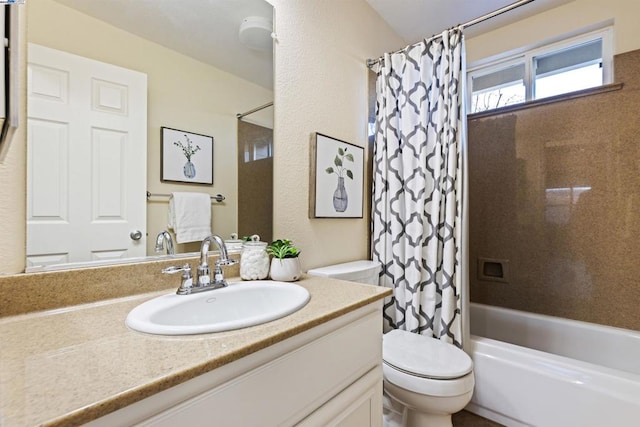 full bathroom with toilet, vanity, and shower / bath combo with shower curtain