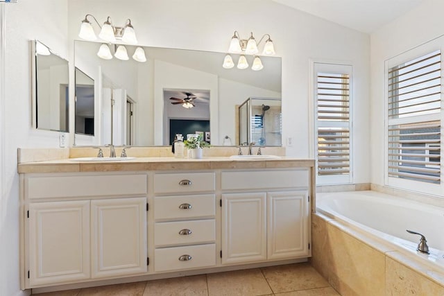 bathroom with ceiling fan, plus walk in shower, tile patterned flooring, lofted ceiling, and vanity